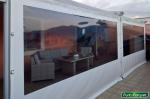 Chiusura pergotenda con teli in PVC 