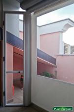 Chiusura pergotenda con teli in PVC 