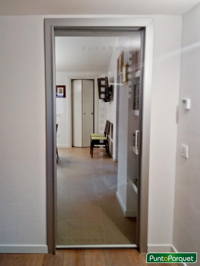 Chiusura pergotenda con teli in PVC 