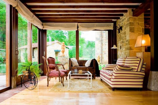 Verande in legno per terrazzo apribili a libro a terni Verande chiuse in vetro